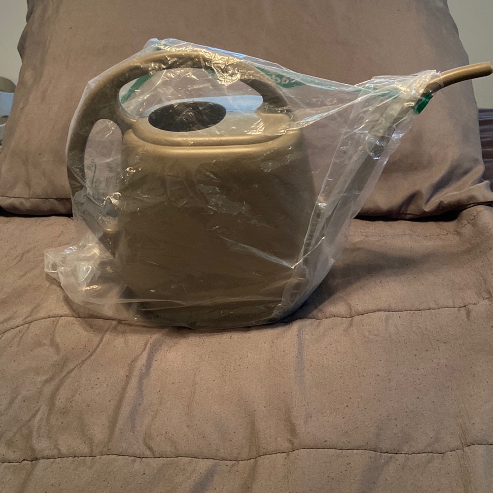 Flower watering bucket